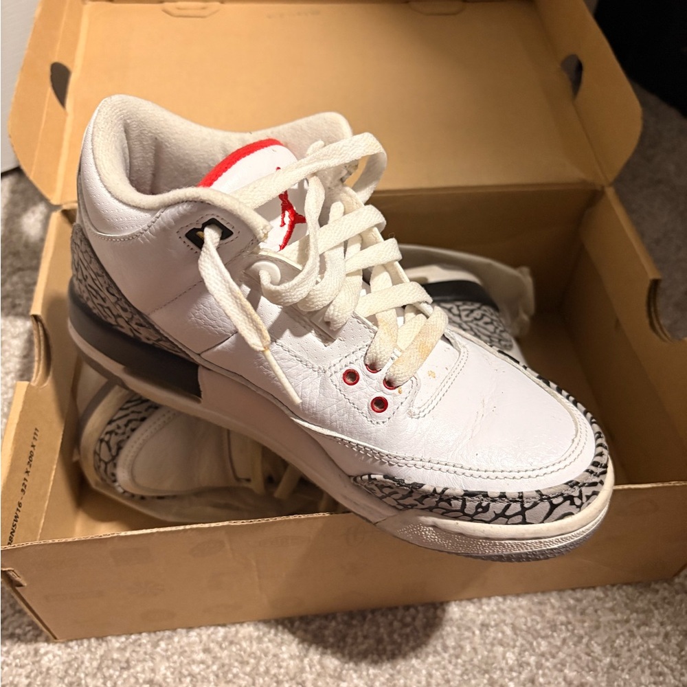 White and Red Sneakers with Black Pattern